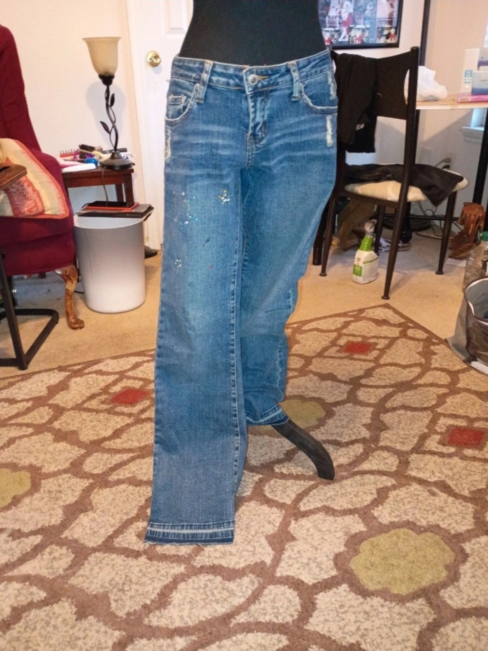 Vintage Bubblegum Faded Blue Wide-Leg Flare Jeans with Subtle Paint Splatter
